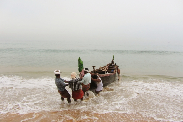Kovalam fishermen fishing Kerala India