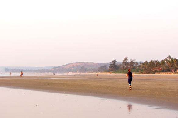 Running on the beach Goa India